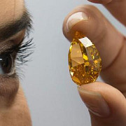 cel mai mare diamant portocaliu din lume vandut la licitatie la geneva