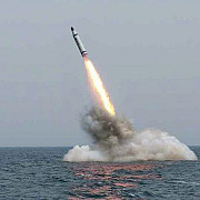 video coreea de nord a publicat imagini cu lansarea unei rachete de pe un submarin