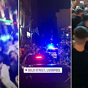 liverpool cateva mii de tineri s-au adunat in centrul orasului au dansat dar au si atacat o masina de politie cu cateva ore inainte de impunerea nivelului maxim de restrictii dupa inchiderea barurilor pe o perioada nedeterminata