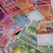 raiffeisen bank scade dobanda pentru clientii cu credite in franci elvetieni